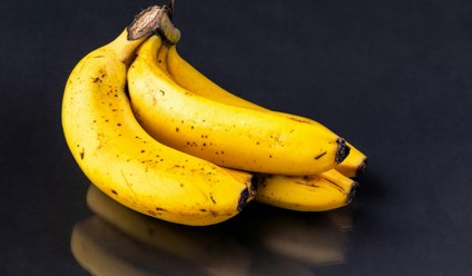 a bunch of bananas sitting on top of a table