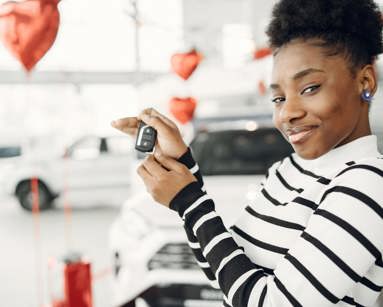 Young woman holding car keys